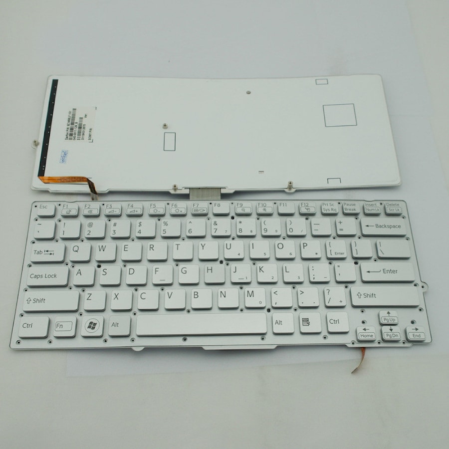 Клавиатура для ноутбука Sony Vaio VPC-SB, VPC-SD серебряная, без рамки, с подсветкой